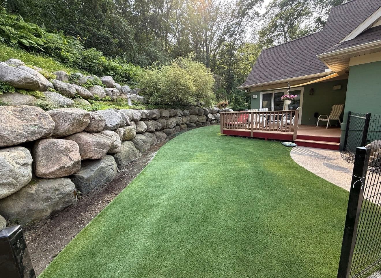 Retaining Walls, Artificial Turf, and Lighting Done Right image